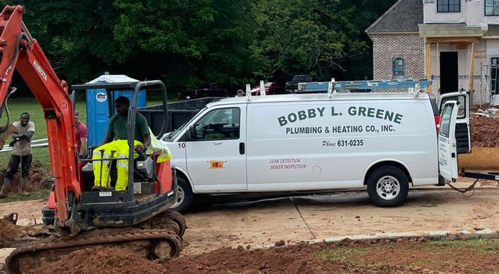truck, techs digging sewer